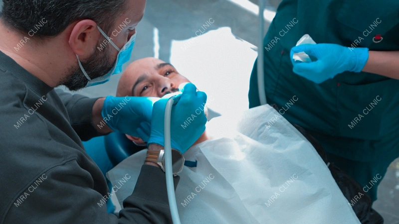 Treatment Plan: Crowns, an Implant, and Full Smile Restoration